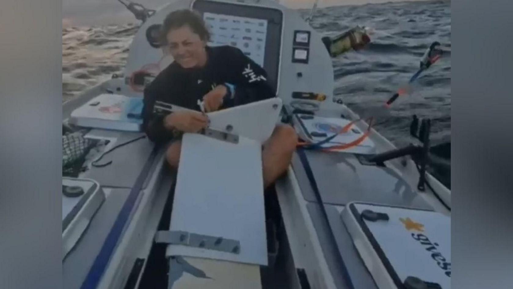 Miriam Payne is on the boat and attempting to make repairs as the small vessel is out on the open sea