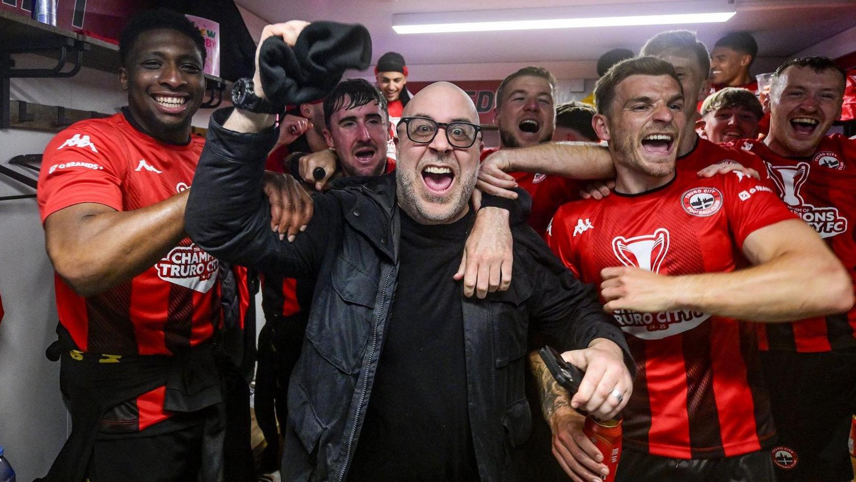 Eric Perez celebrates with Truro City players
