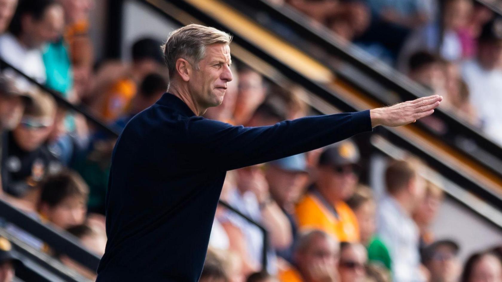 David Hughes on the Newport touchline 