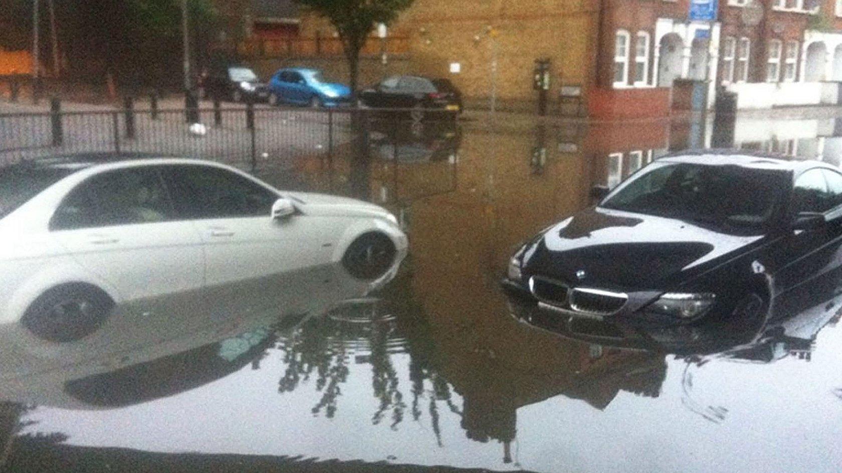 Cars on a flooded street