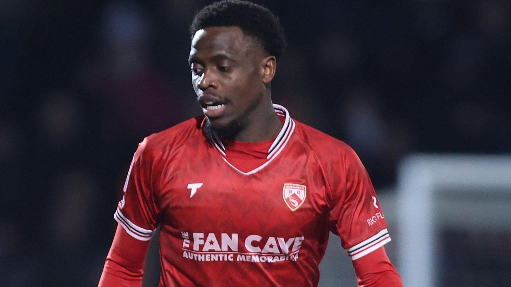 David Tutonda playing for Morecambe against Doncaster Rovers in 2025
