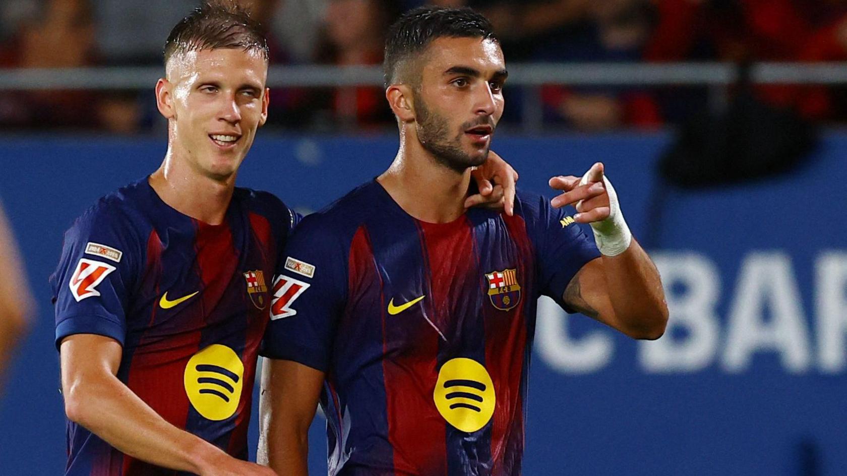 Barcelona's Ferran Torres celebrates scoring their second goal with Dani Olmo