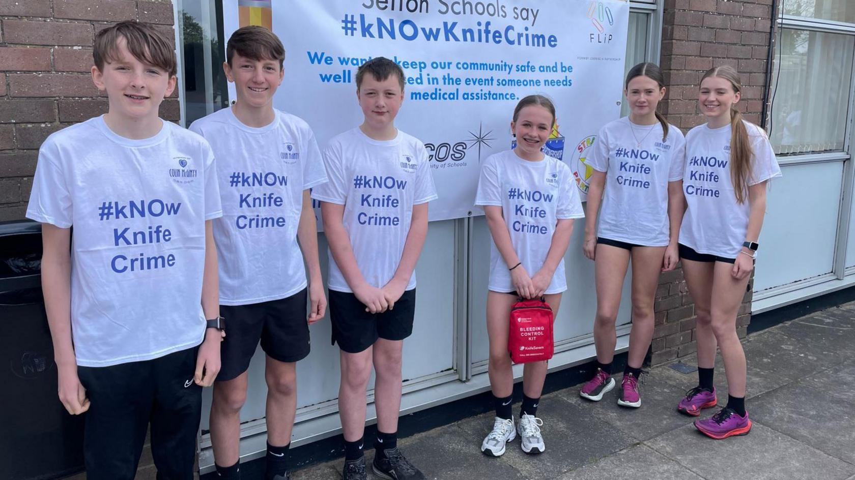 School children wearing Know Knife Crime t-shirts