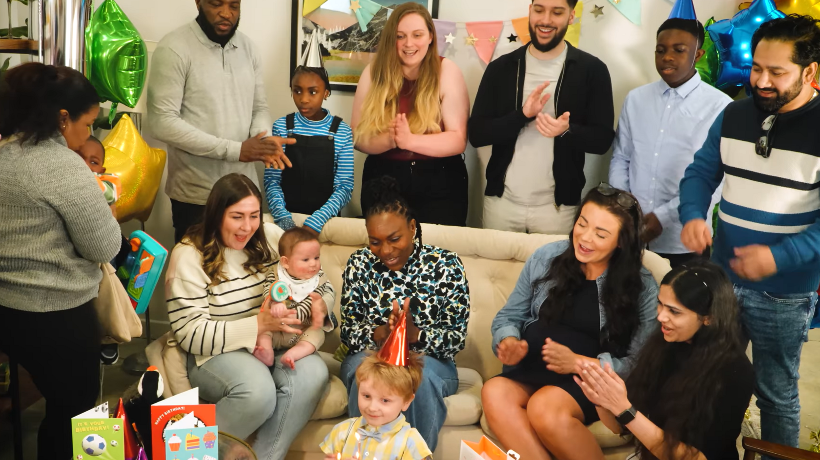 A group of parents celebrating a child's birthday