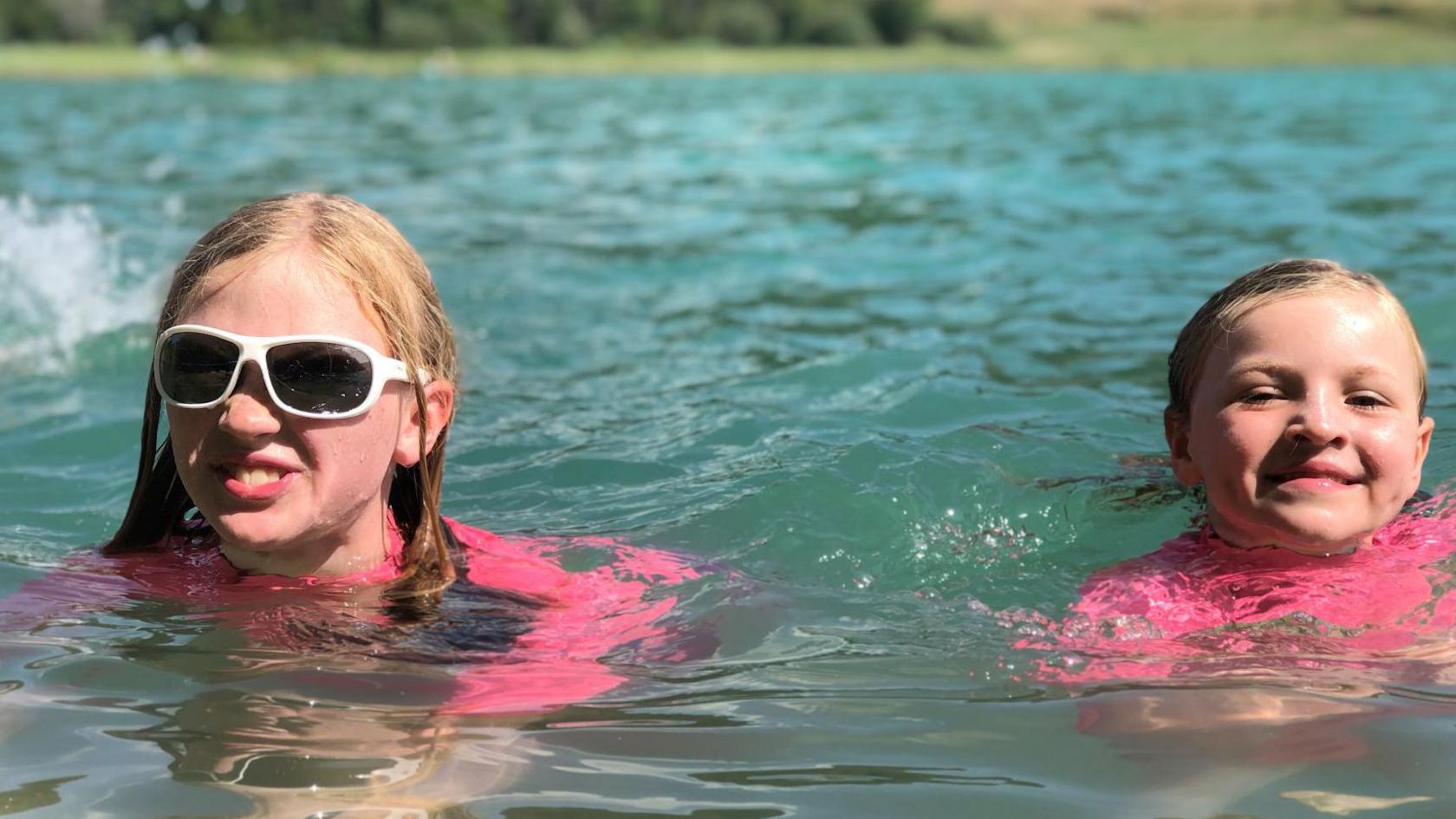 Astrid and Ursula have been swimming together since early childhood.