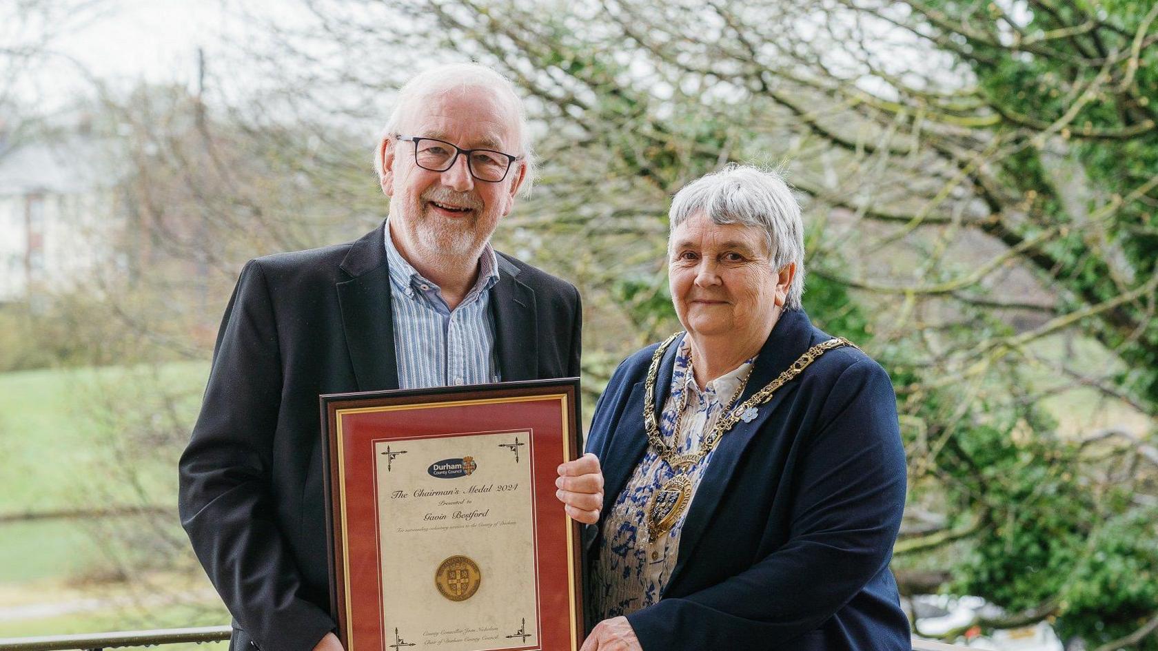 Gavin Bestford and his Chairman's Medal presented by Councillor Joan Nicholson