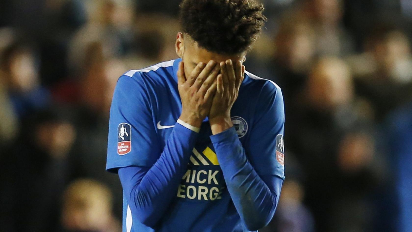 Lee Angol looks dejected