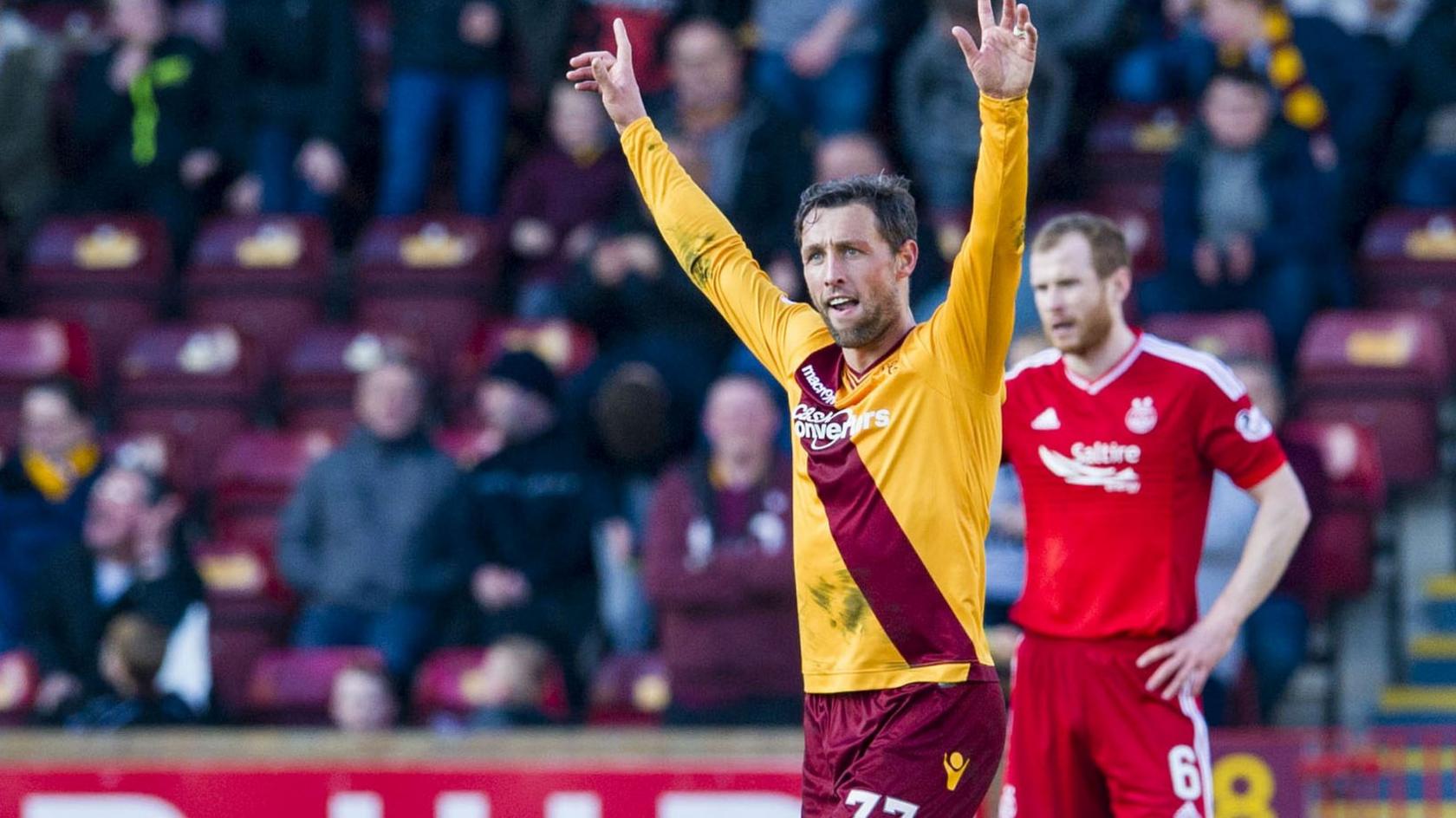 Scott McDonald celebrates his equaliser for Motherwell