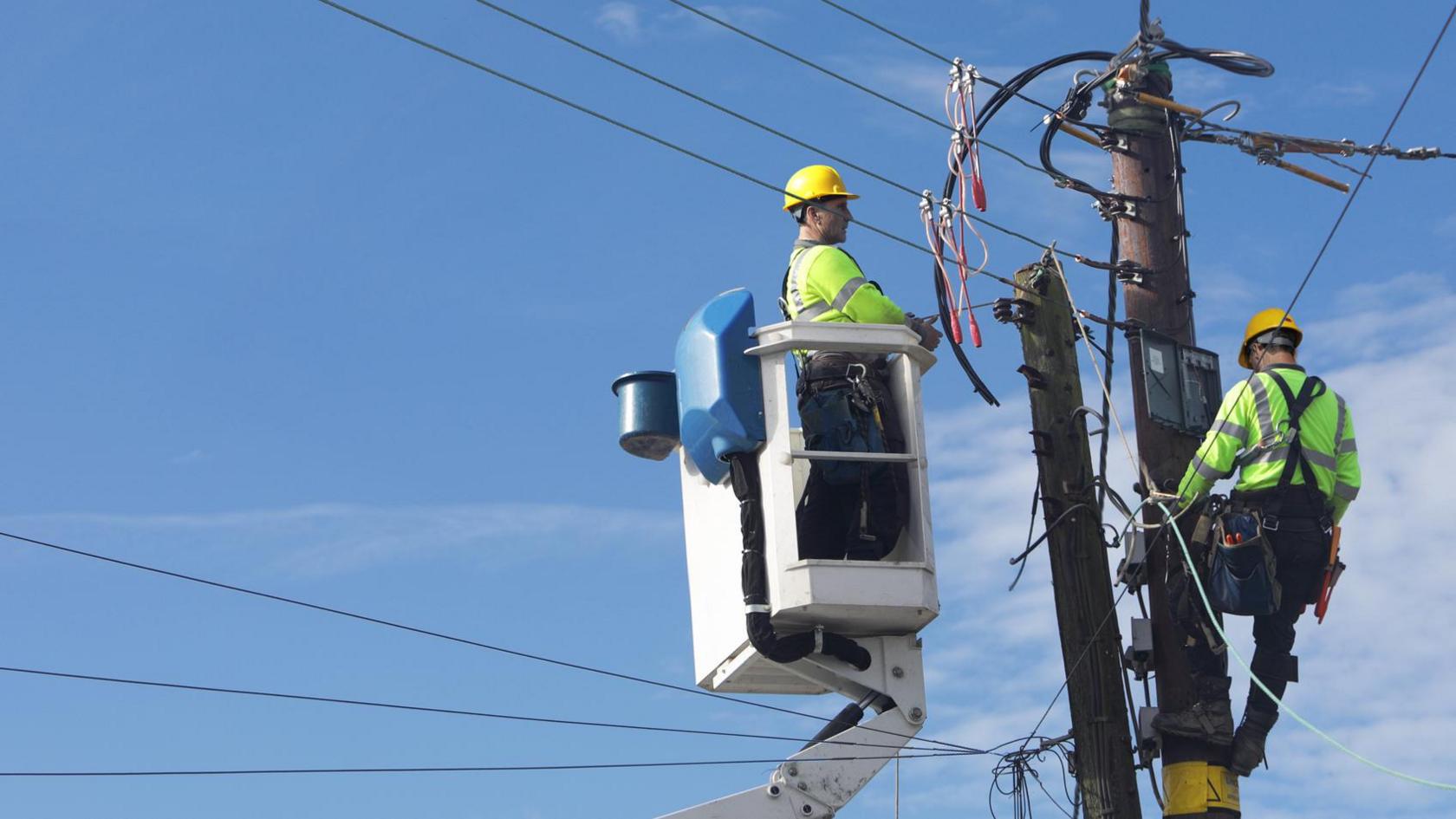 men working on transmission lines