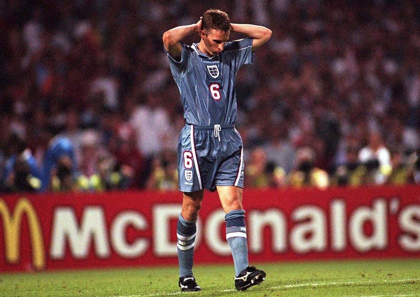 Gareth Southgate walking away after missing a penalty