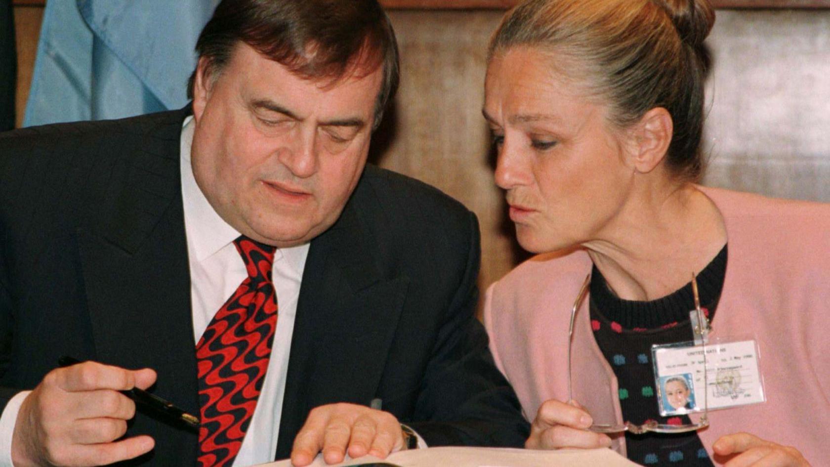 Deputy Prime Minister John Prescott signs the Kyoto treaty on climate change after EU Environment Commissioner Ritt Bjerregaard, at the United Nations in New York