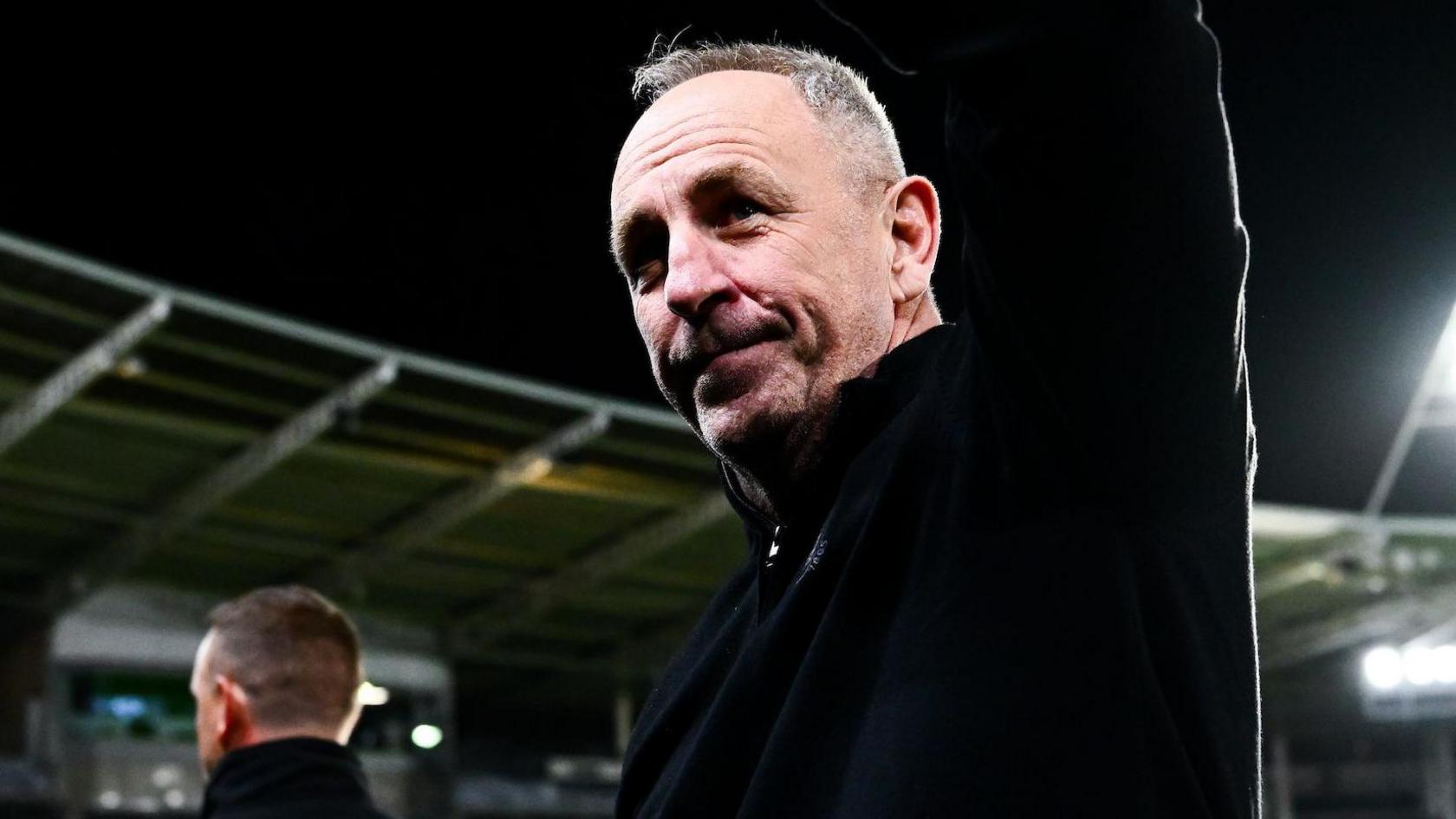 John Cartwright looking up to the stand waving after his final game in charge of Hull