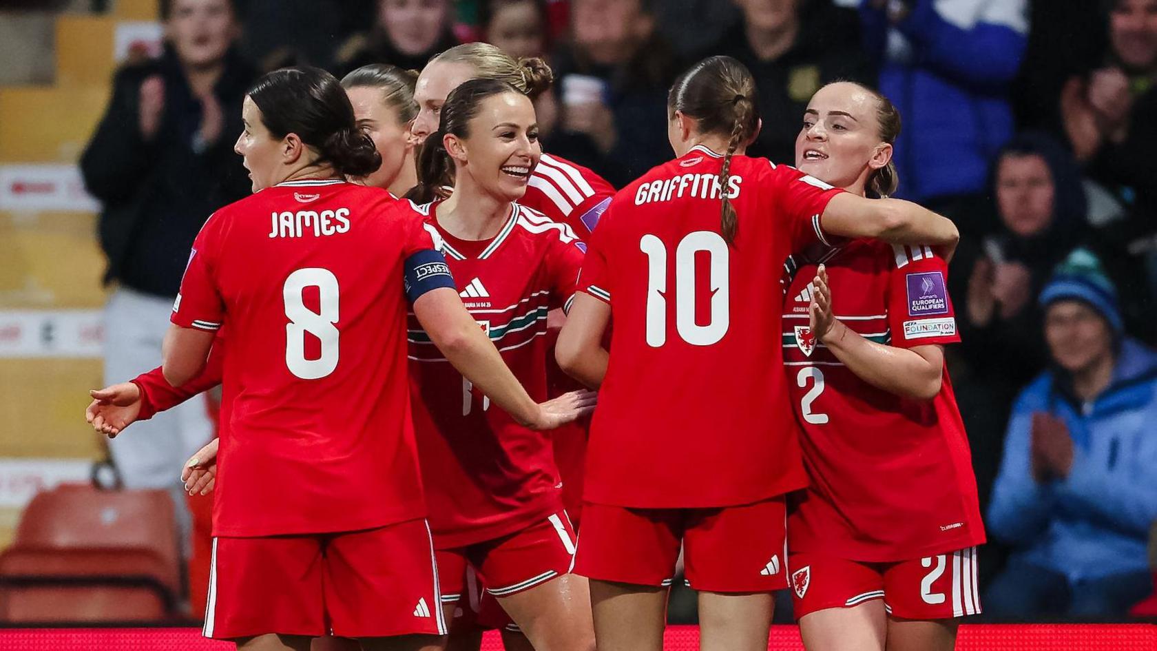 Wales players celebrate Hannah Cain's early opener 