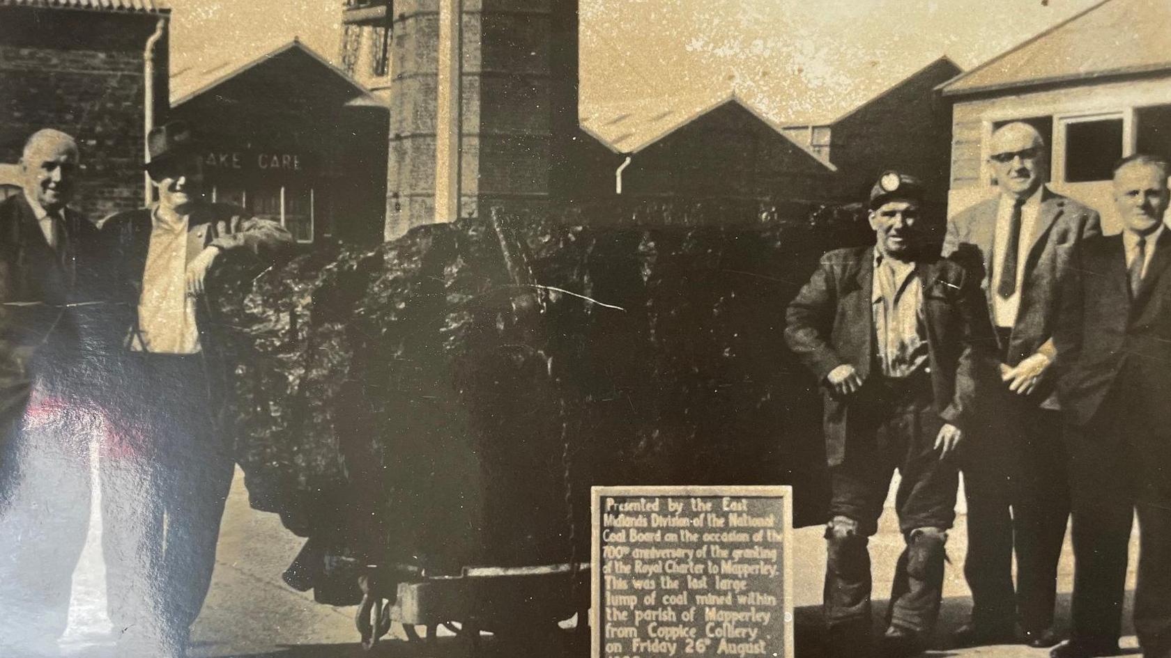 A sepia photo showing the last piece of coal to be extracted from Coppice Colliery in the 1960s
