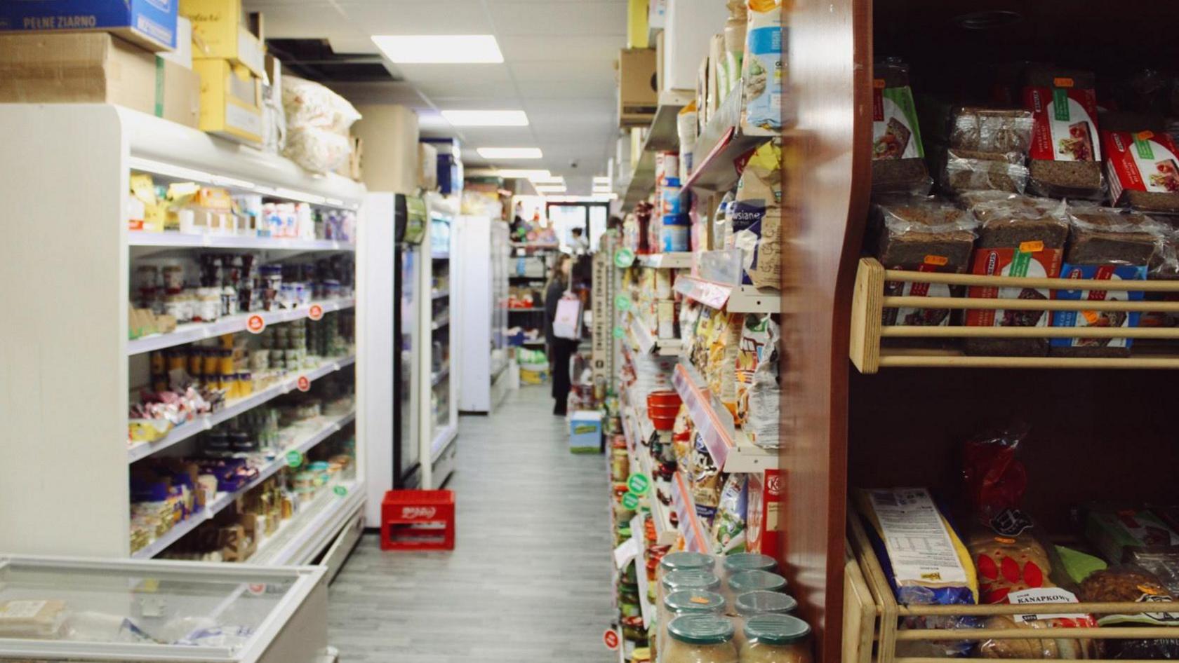 The inside of a corner shop.