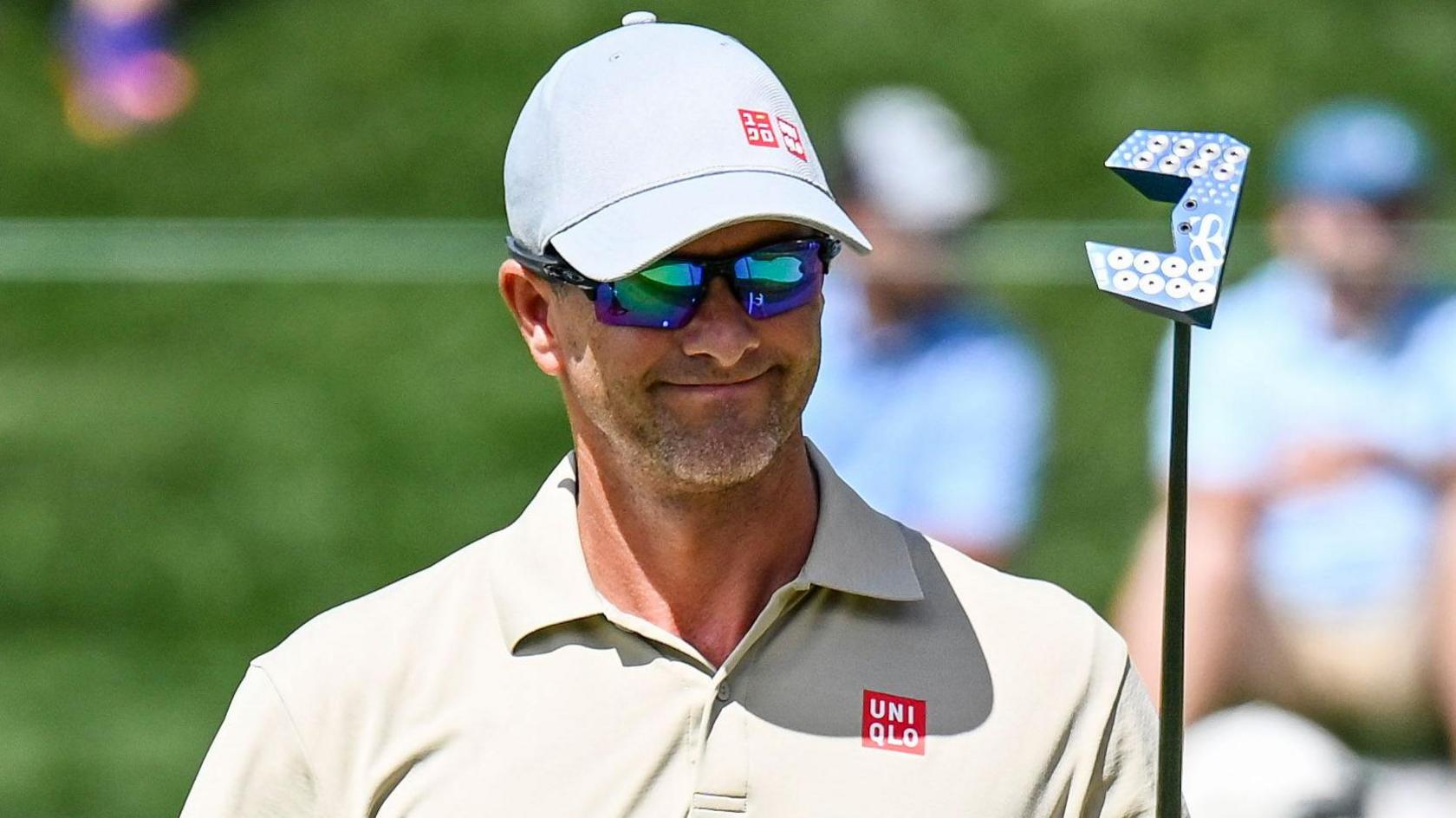 Australia's Adam Scott smiles after his nine-under-par 63 in the second round of the BMW Championship