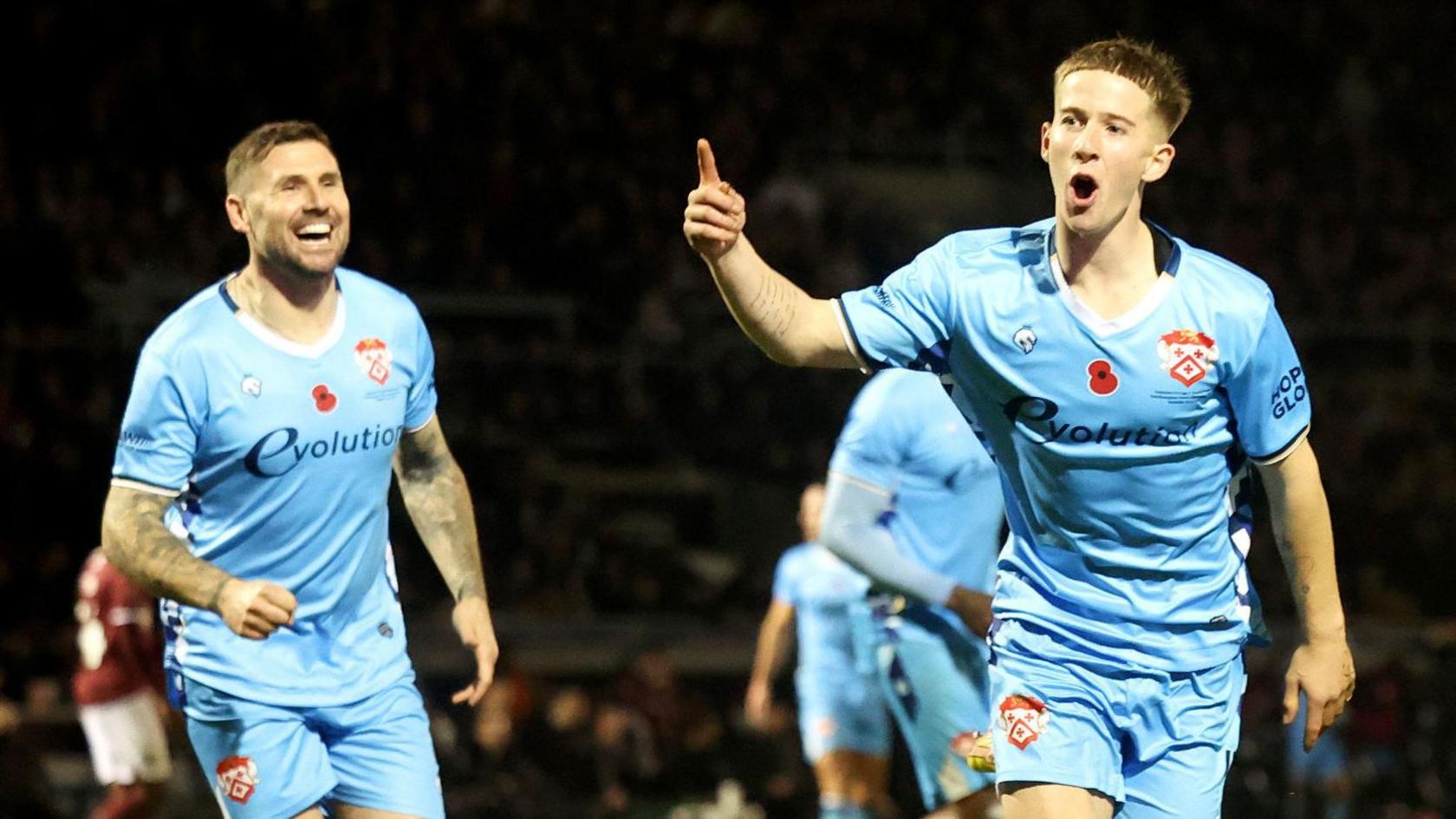 Kettering's Luca Miller celebrates after scoring against Northampton Town