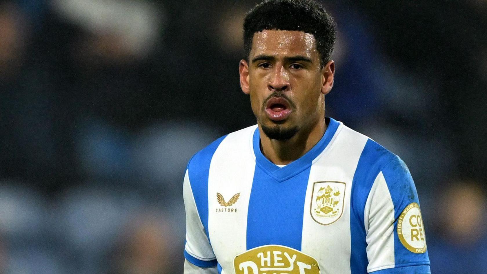Marcus McGuane in action for Huddersfield Town