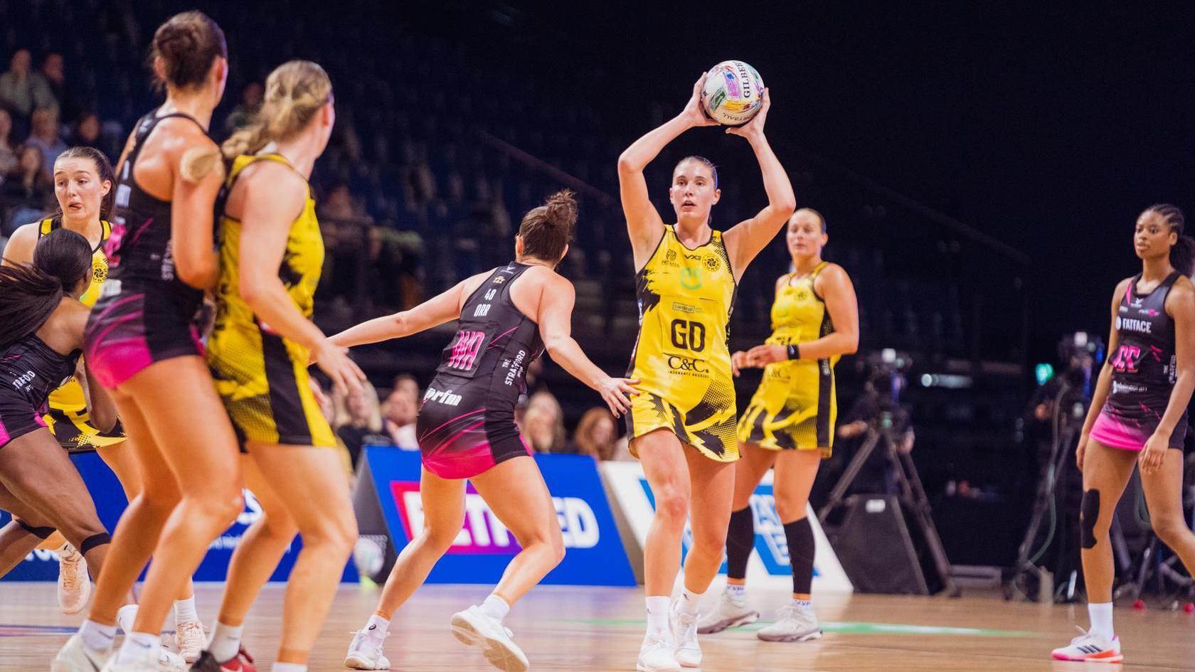 Nicola Smith prepares to play the ball