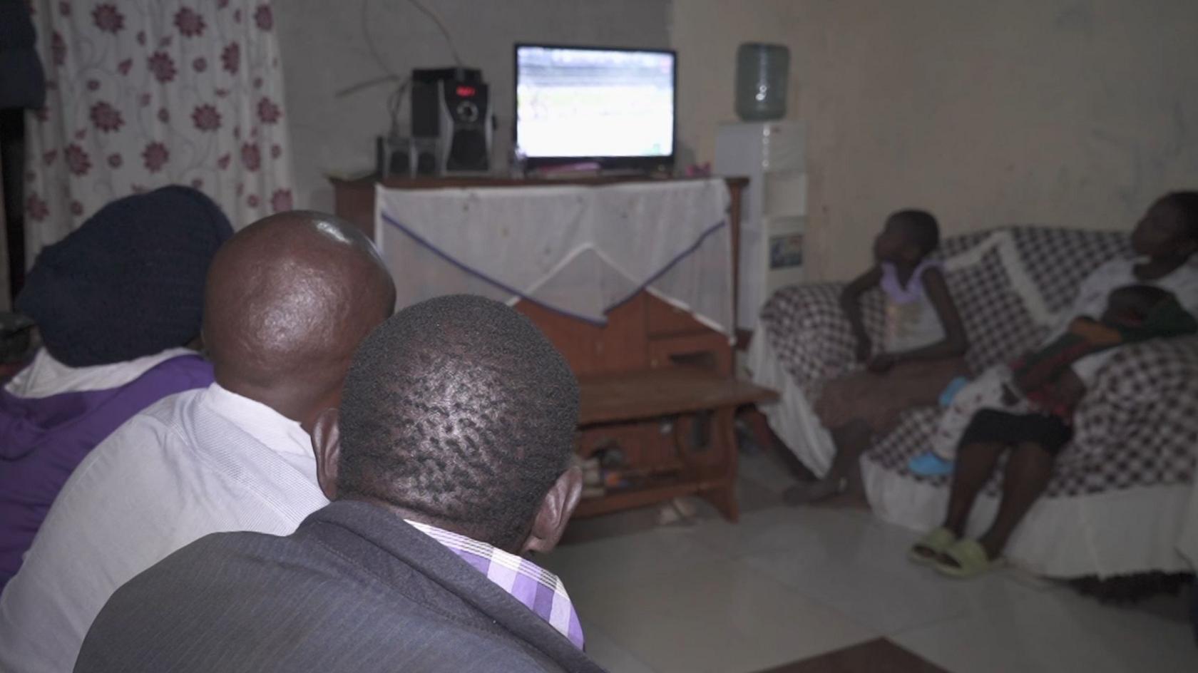 Nicholas Nguku gathered his friends and family to watch the Paris Olympic games at his home in a village west of Nairobi