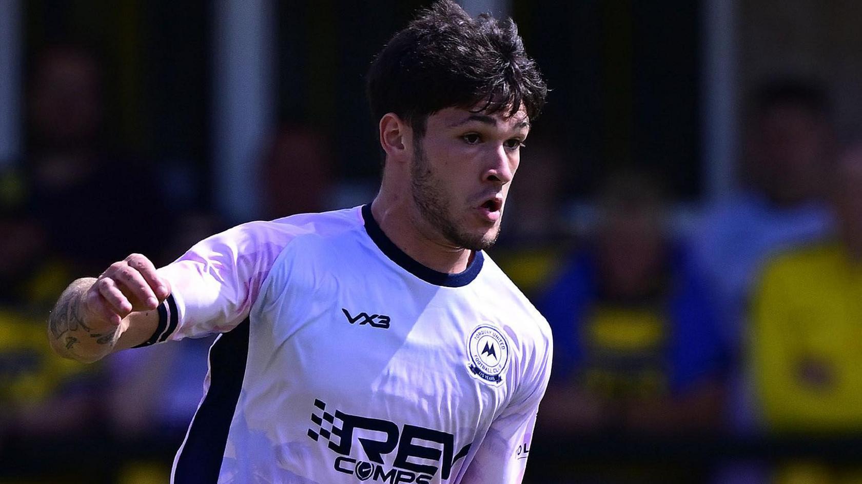 Jadyn Crosbie in action for Torquay United