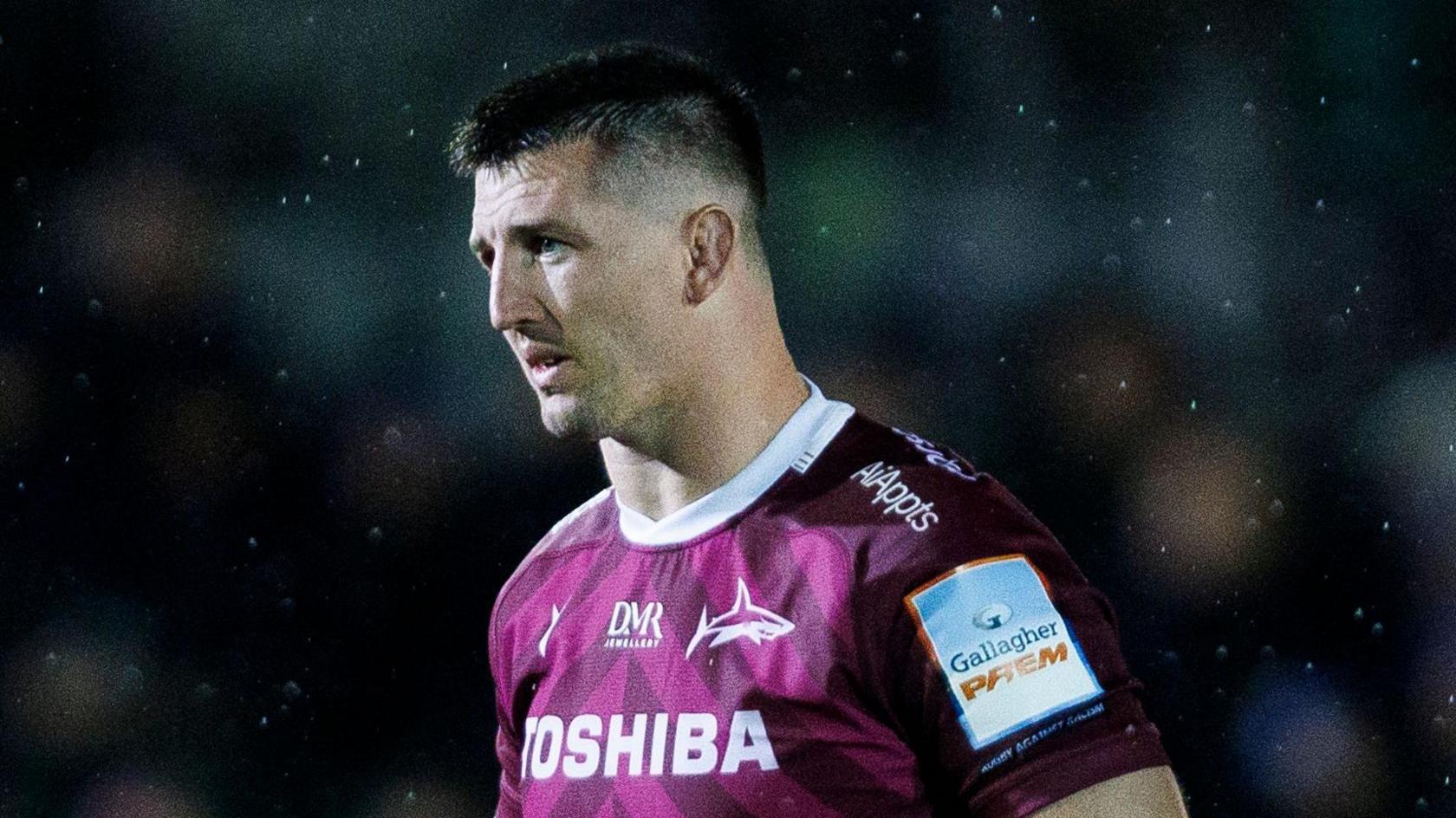 Ben Curry standing on the field during Sale's match against Bath