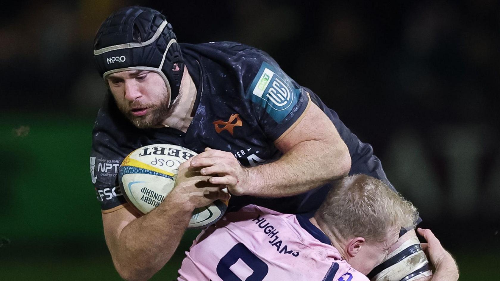 Morgan Morris carries the ball for Ospreys