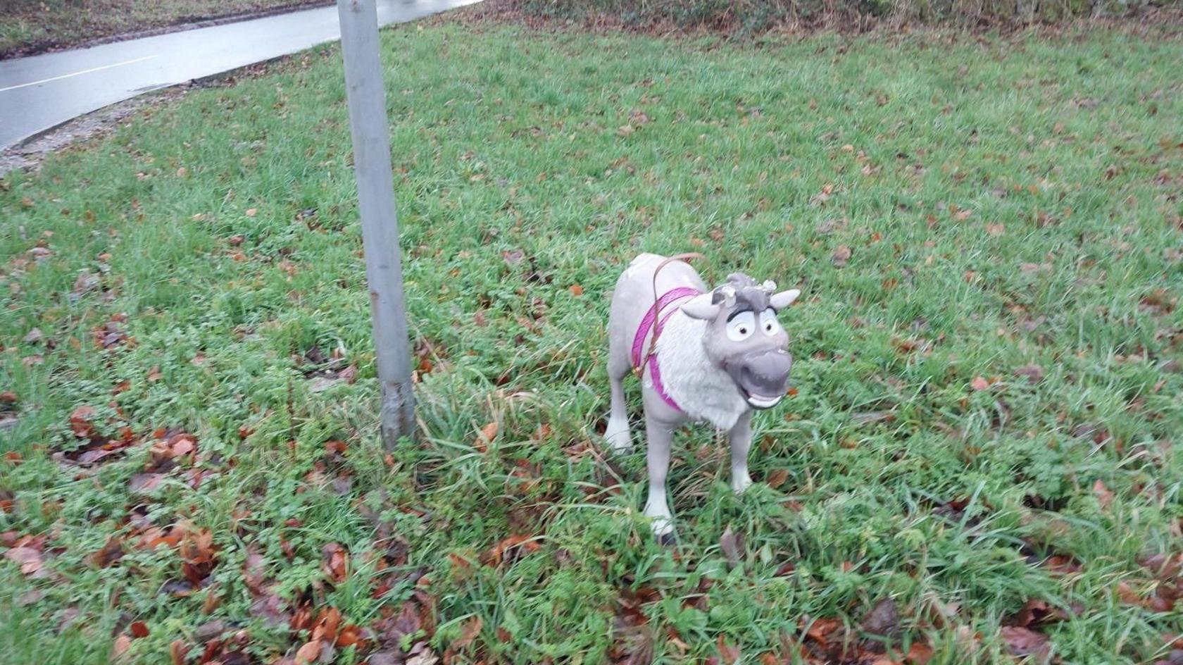 Toy reindeer stood next to a lamppost by a roadside in Derbyshire