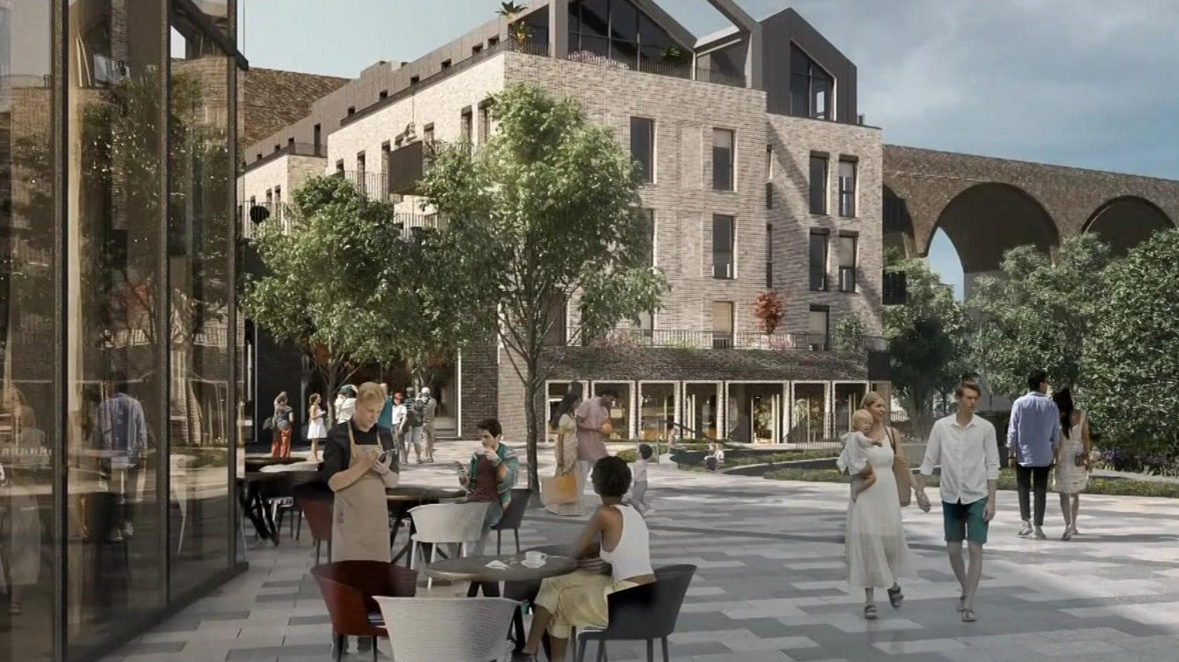 An artists impression of a new development. People walk around a tree lines square surrounded by tall buildings. A cafe is on one side where people enjoy drinks at outside tables.