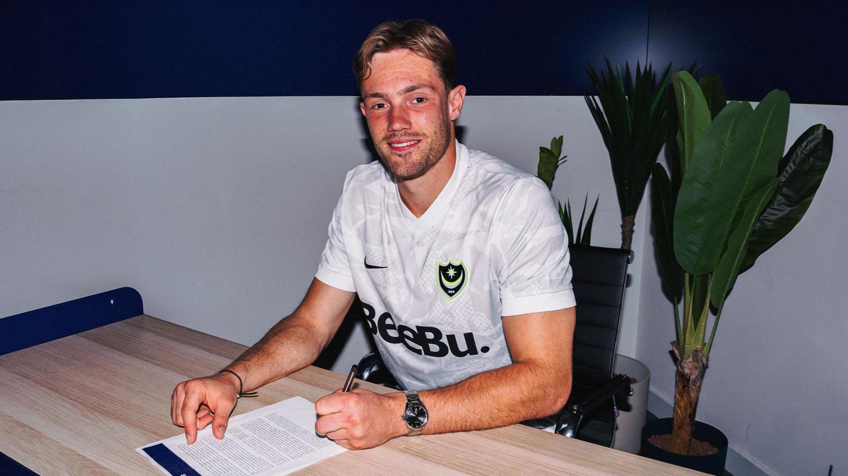 New Portsmouth signing Josef Bursik poses for a photo after signing his contract 