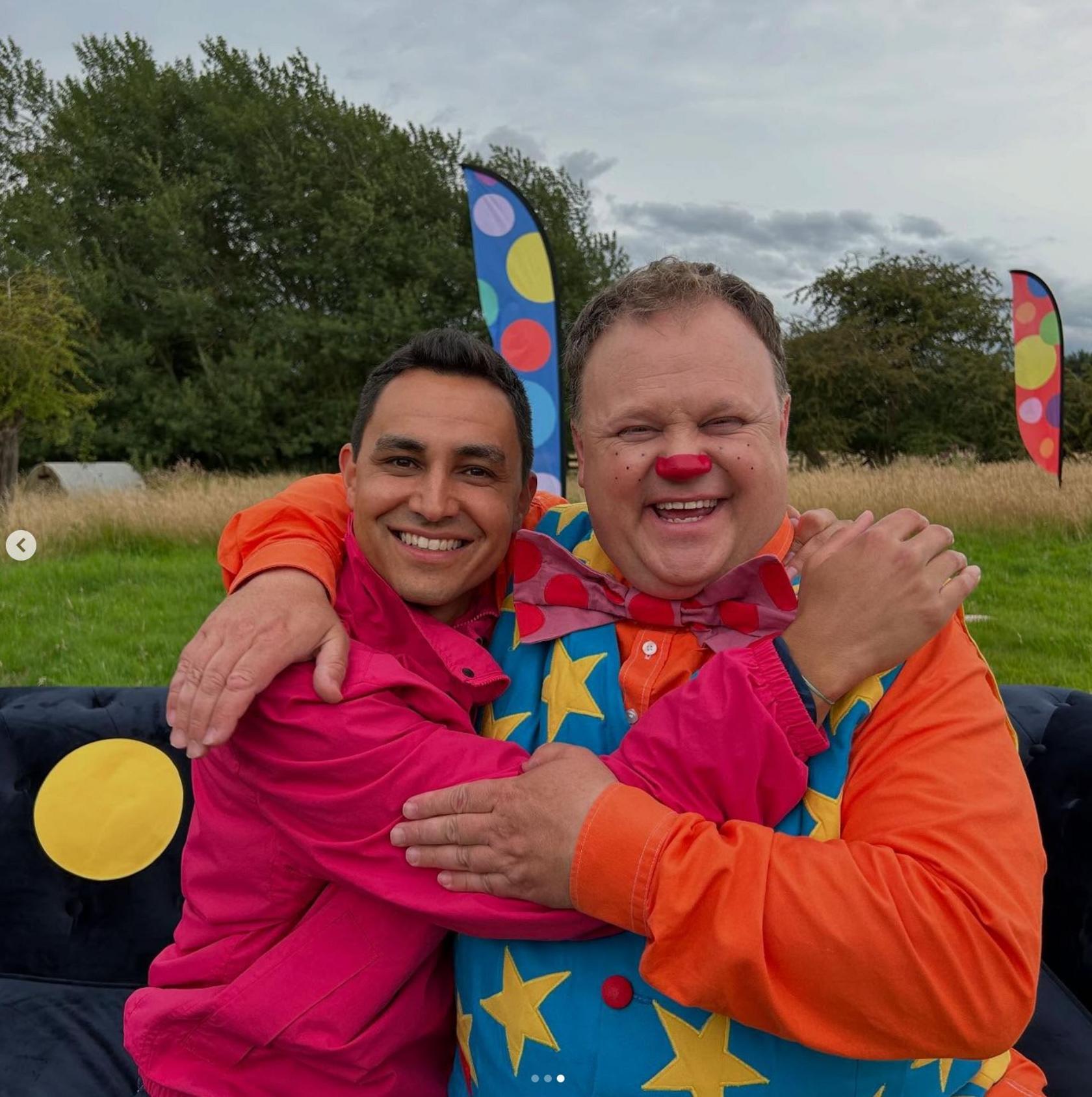 Ben Cajee and Mr Tumble embrace