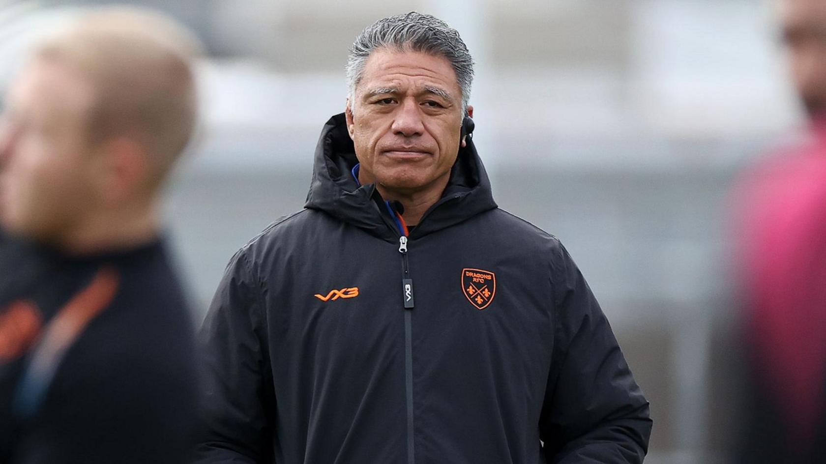 Dragons head coach Filo Tiatia watches his team in the warm-up at Rodney Parade