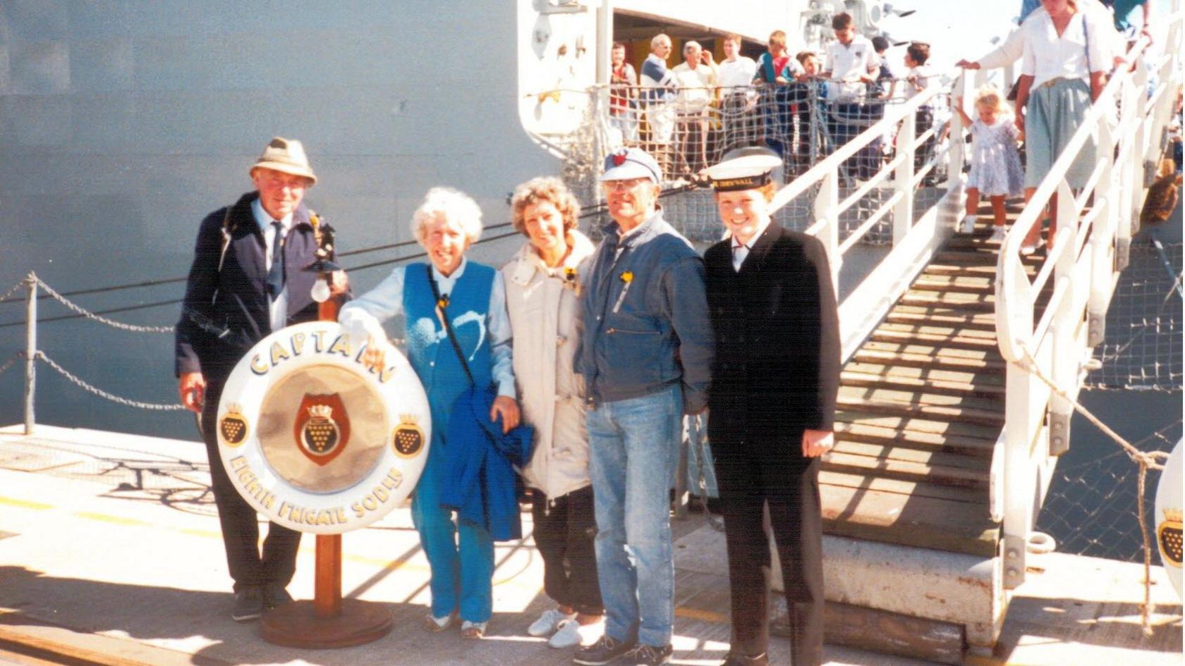 Emma Riley with her family on the dock