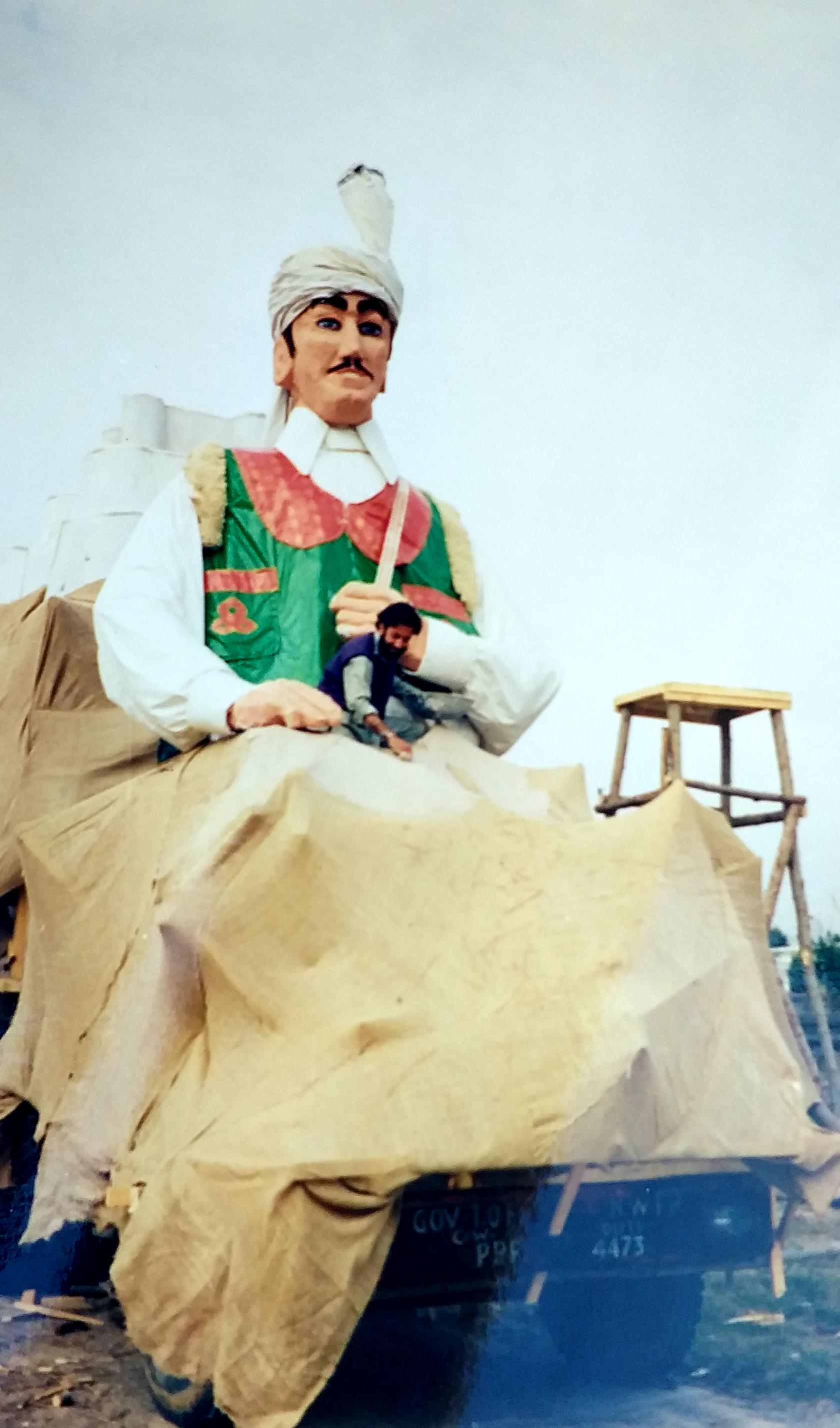 Nasim Yousufzai stands on the float he made