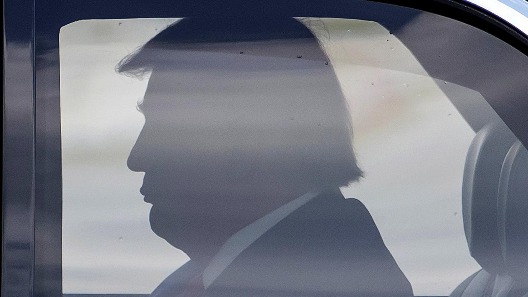 US President Donald Trump sits in the presidential armoured state car known as "The Beast" in Atlanta, Georgia, 15 July 2020