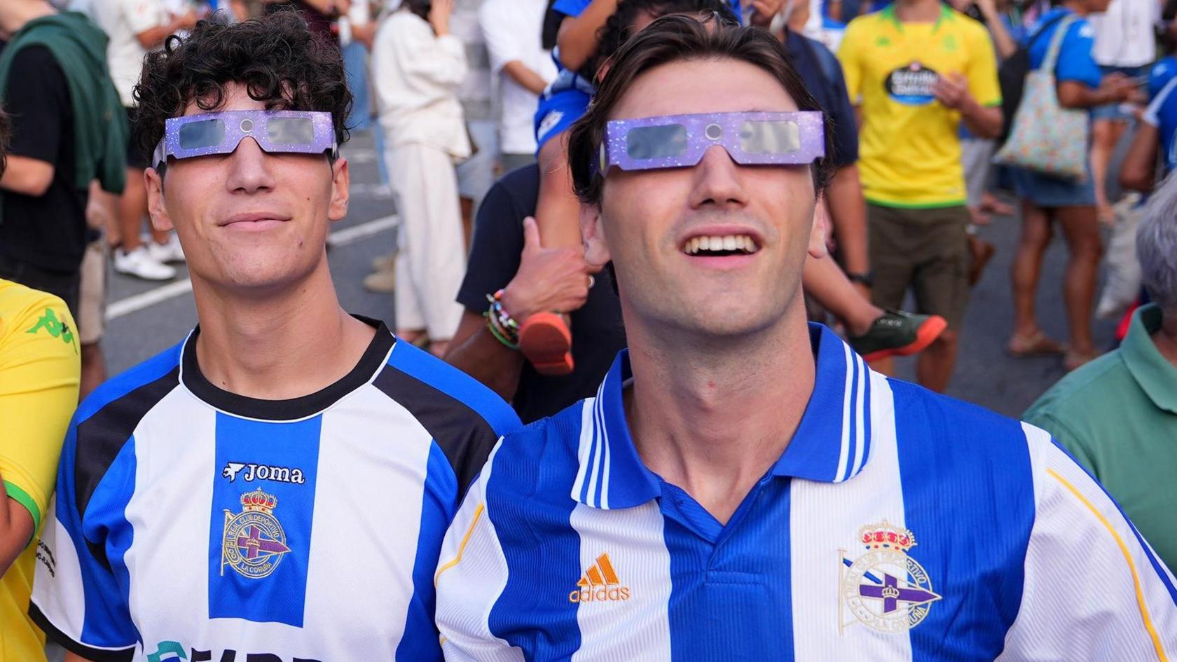 Deportivo La Coruna fans don special glasses prior to a pre-season friendly against Real Madrid