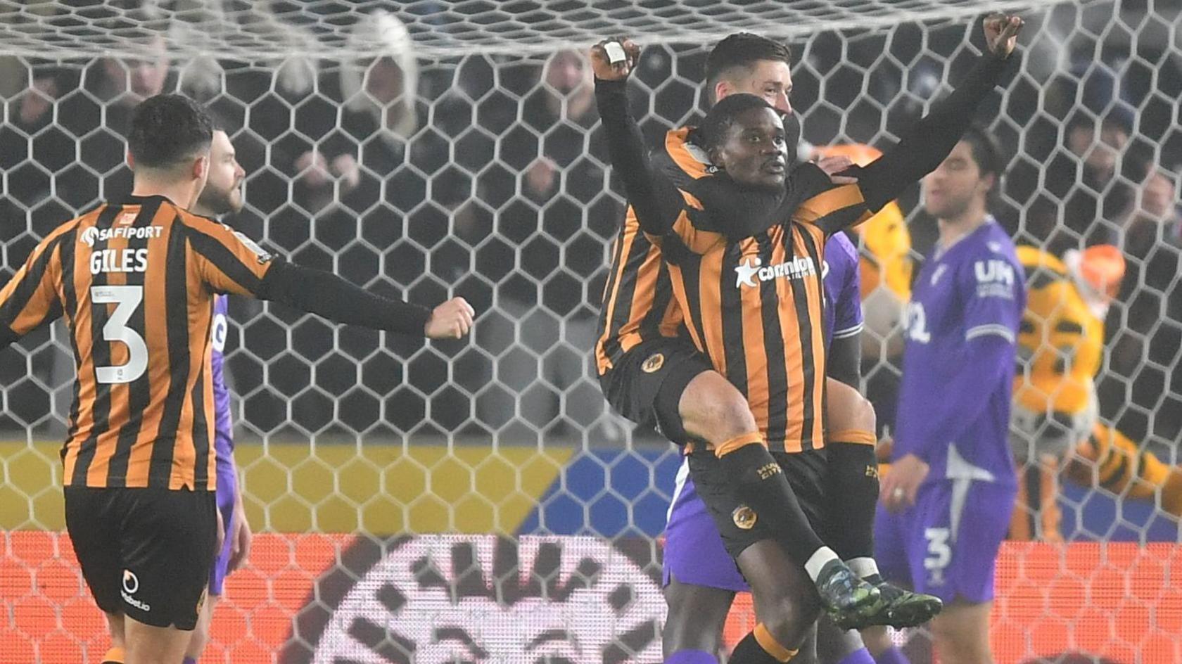 Chris Bedia celebrates scoring for Hull City