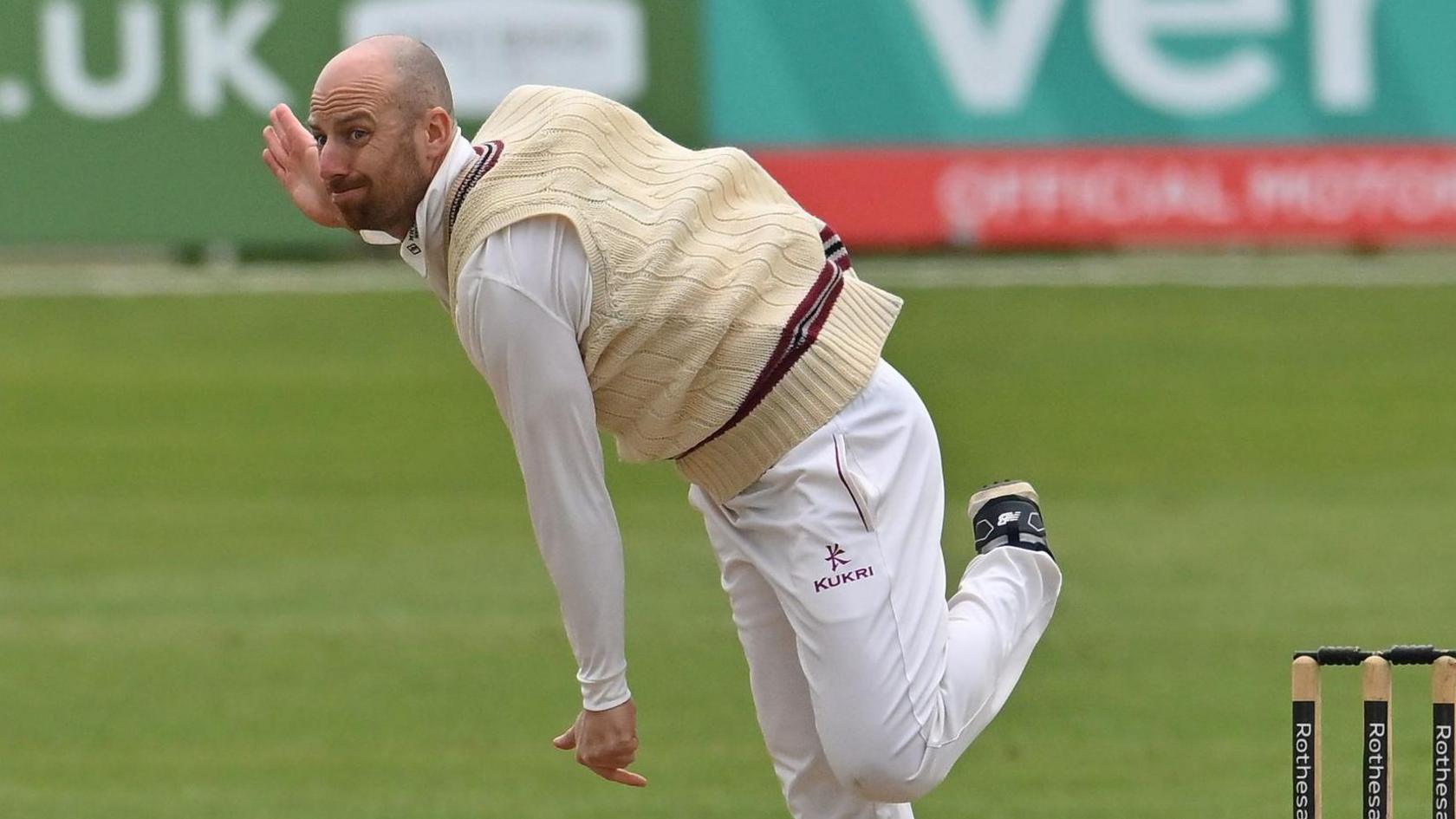 Former England spinner Jack Leach bowling for Somerset