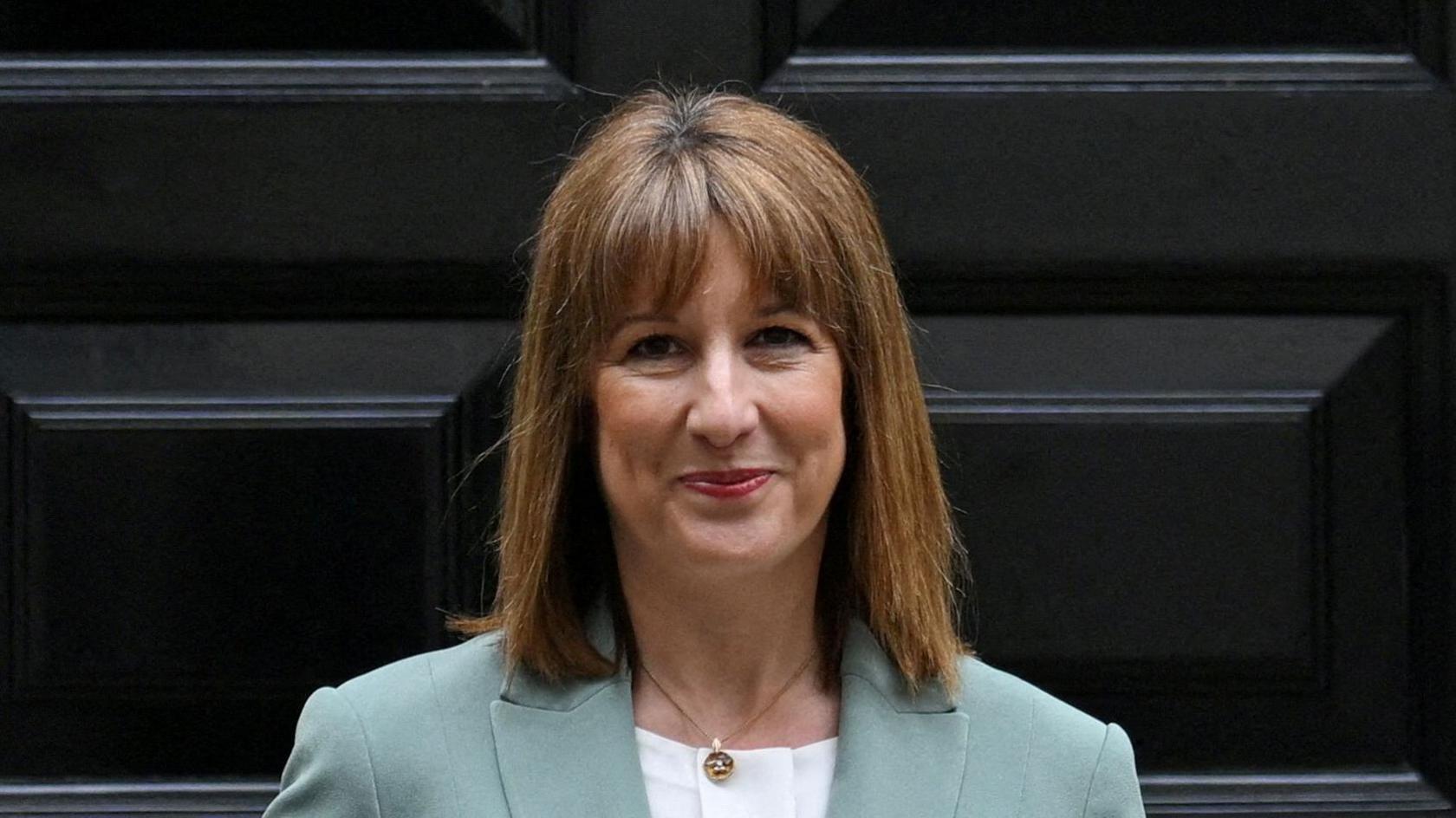 Rachel Reeves stood in front of her house's black door