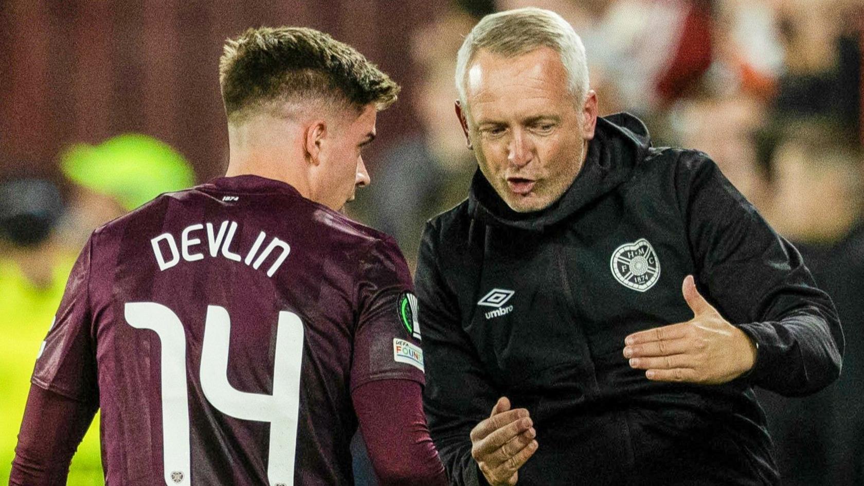 Hearts midfielder Cammy Devlin with head coach Neil Critchley