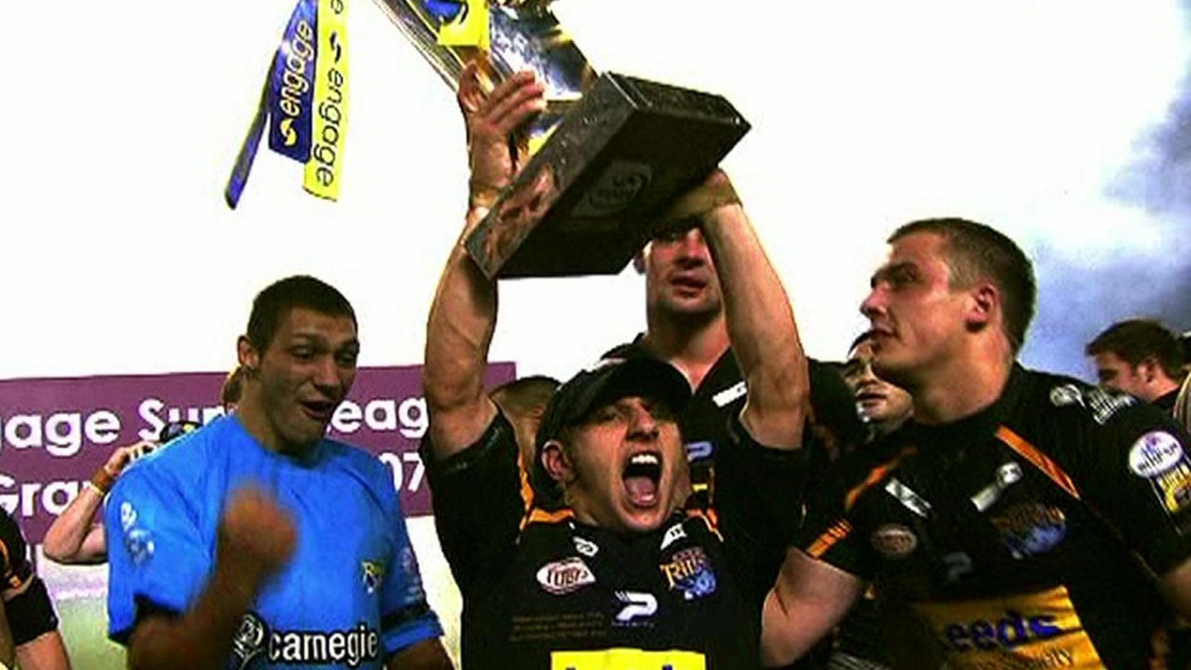 Rob Burrows holding trophy