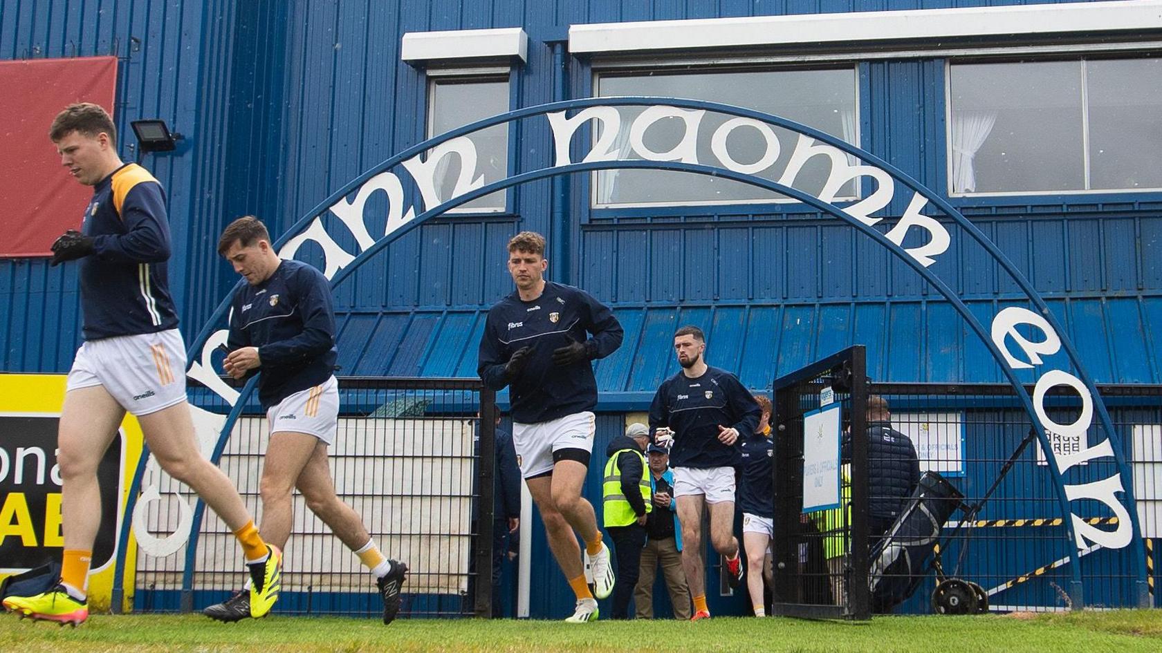 Antrim players take the field at Corrigan Park