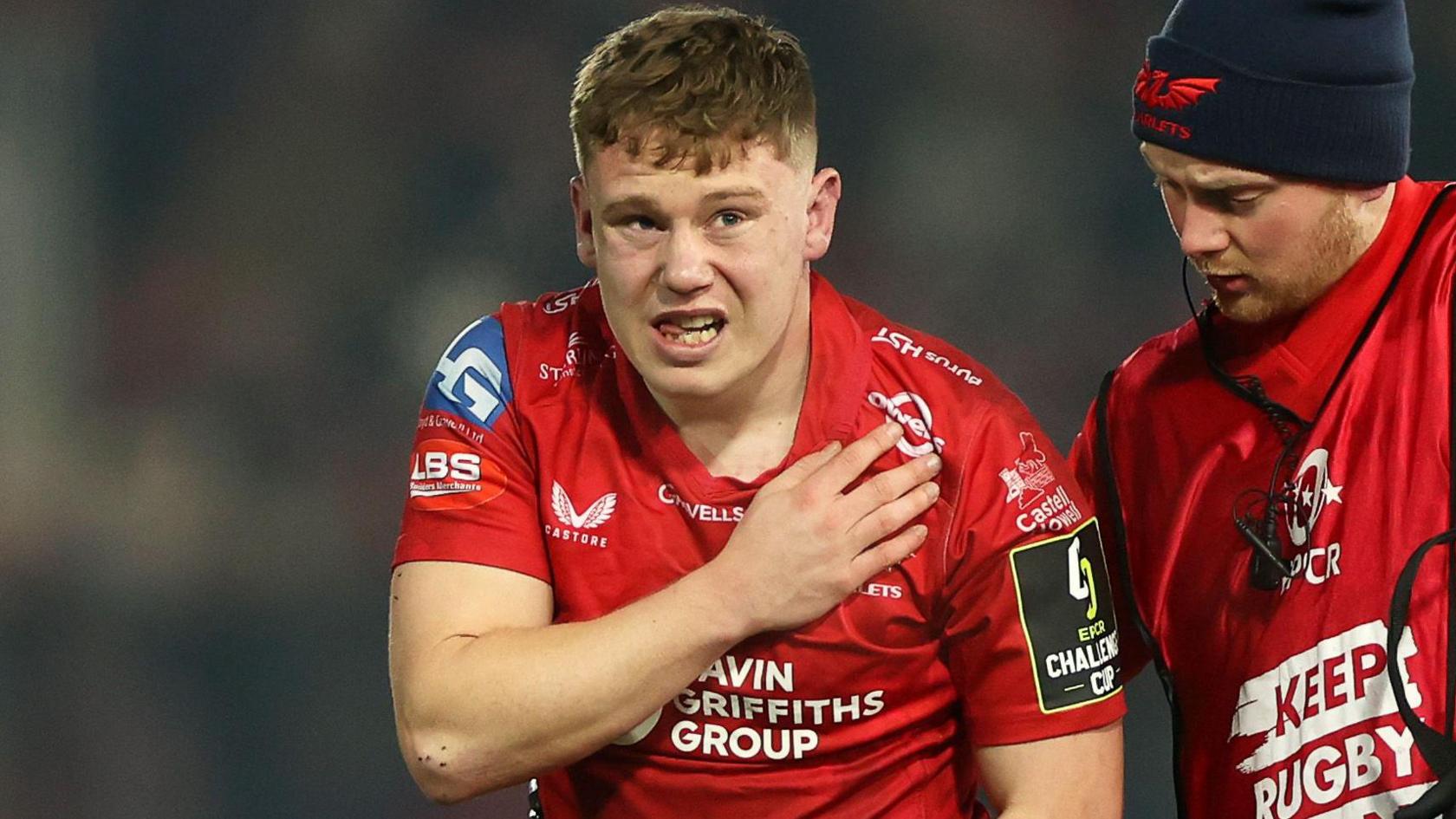 Sam Costelow looks in pain as he leaves the field at Gloucester