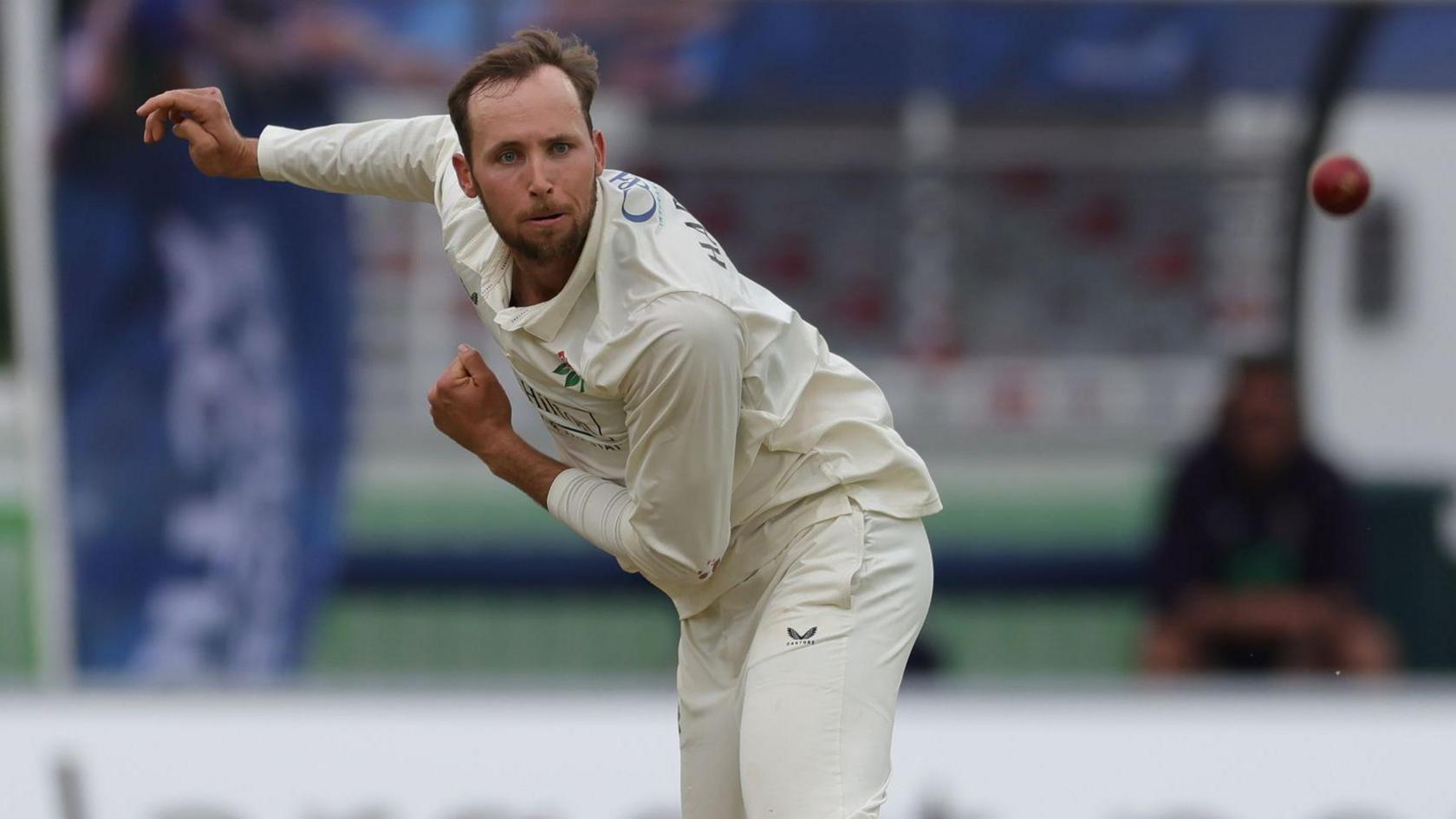Tom Hartley bowling