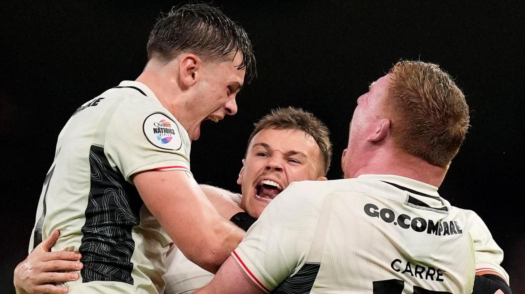 Wales celebrate after the final whistle against Japan