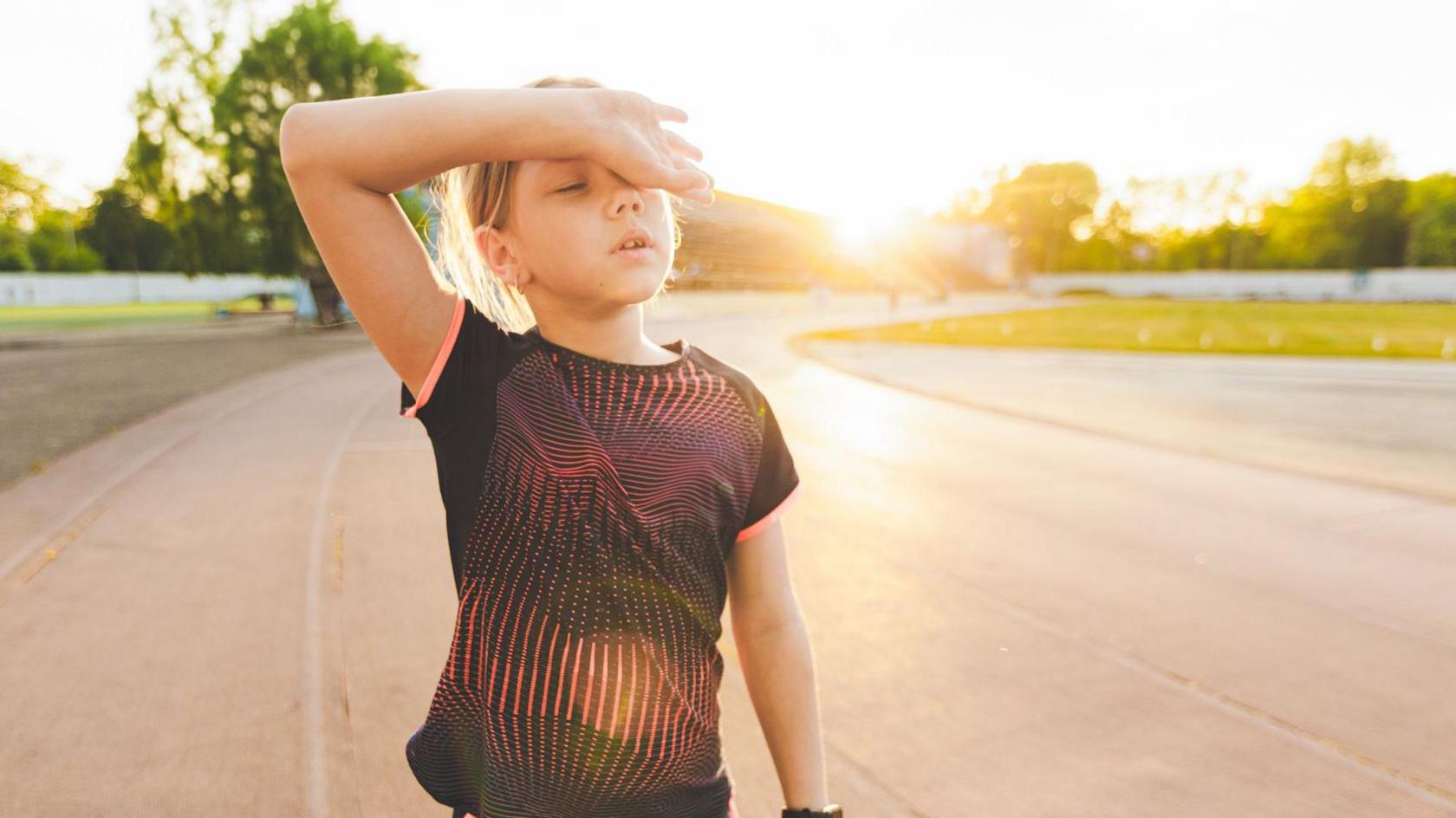 Child on a running track