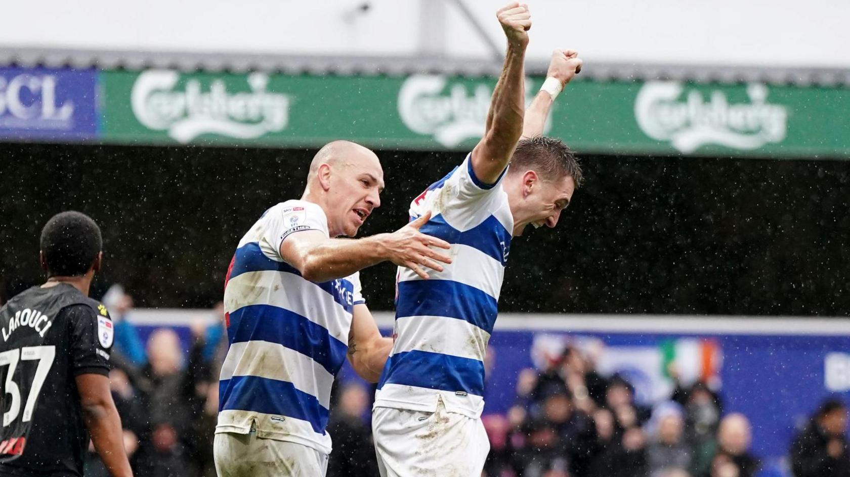 QPR's first-half goalscorers against Watford Michael Frey and Jimmy Dunne celebrate 