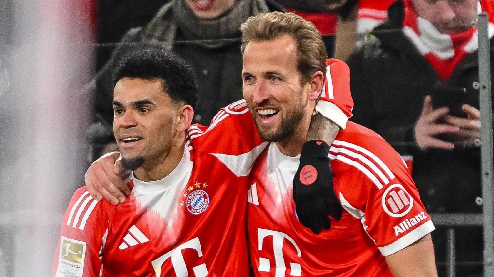 Harry Kane celebrates with Bayern Munich team-mate Luis Diaz