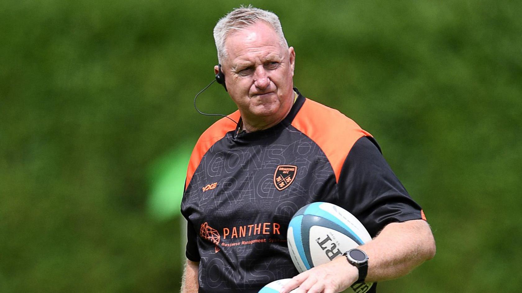 Dragons defence coach Dale MacLeod watches on at training