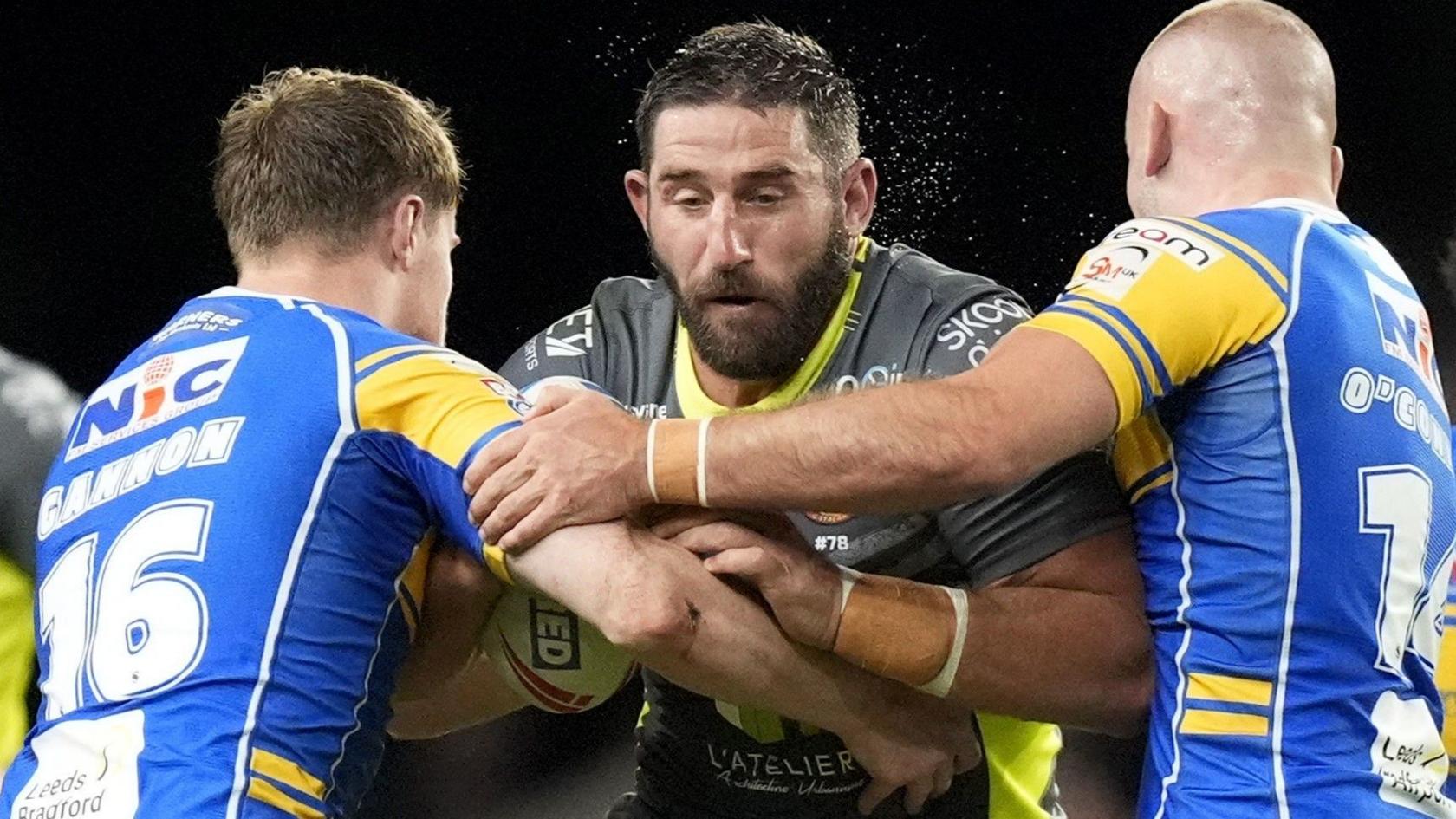 Julian Bousquet carries nan shot for Catalans Dragons